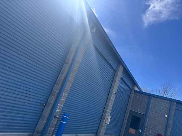 Blue commercial steel roll-up doors