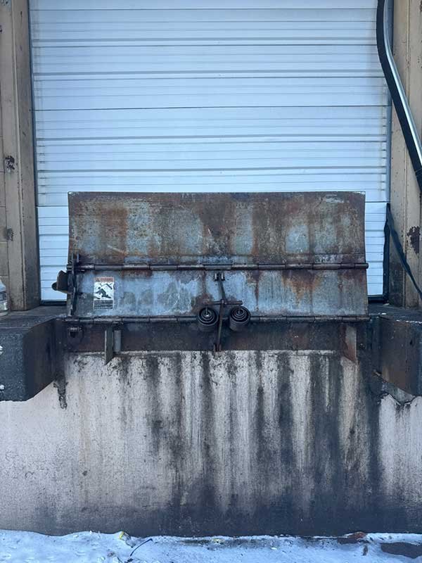 Commercial dock plate at a loading bay